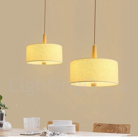 Moderne Pendelleuchte aus Holz im Trommelstil mit Stoffschirm Moderne Pendelleuchte aus Holz im Trommelstil mit Stoffschirm